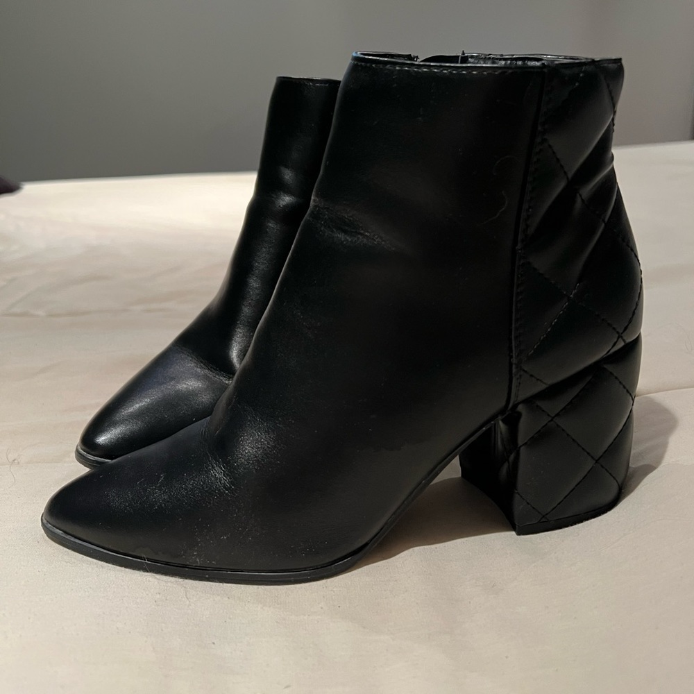 Spring heeled ankle boots